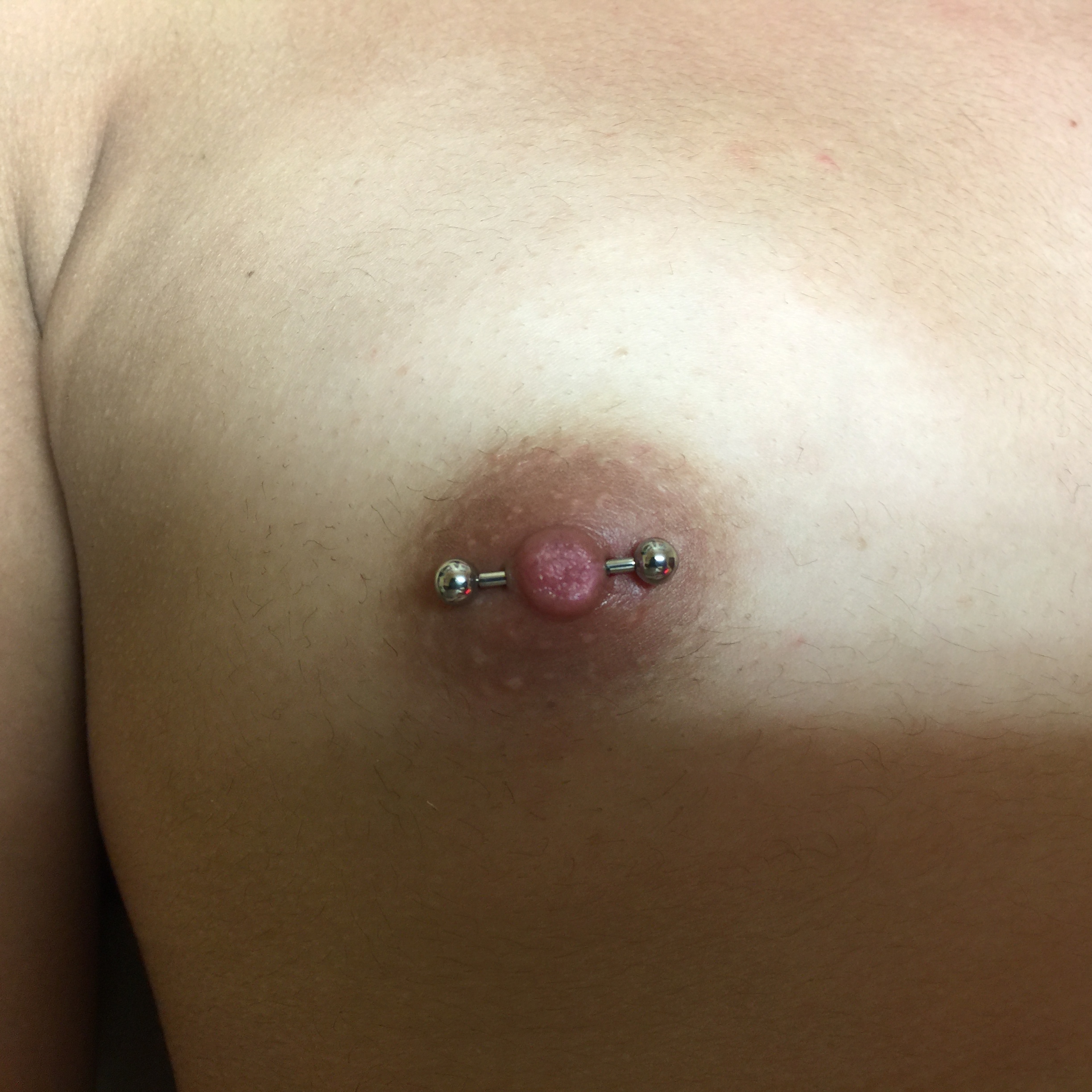 Nipple piercing cross